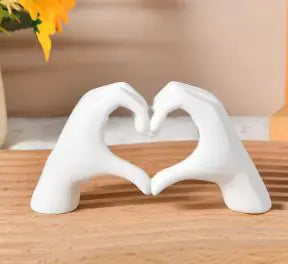 Trendy elegant Heart Hand Statue Sculpture